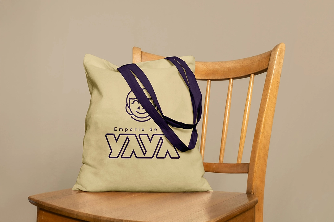 Free Canvas Bag on Chair Mockup copia